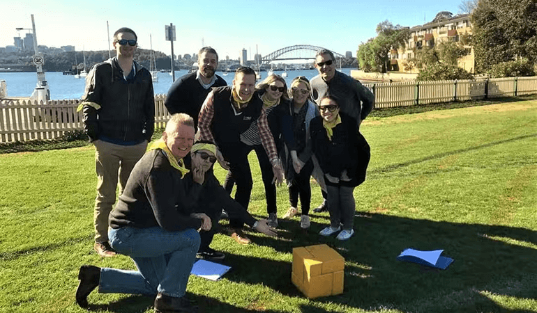 Outdoor activity with people standing on a grassy area